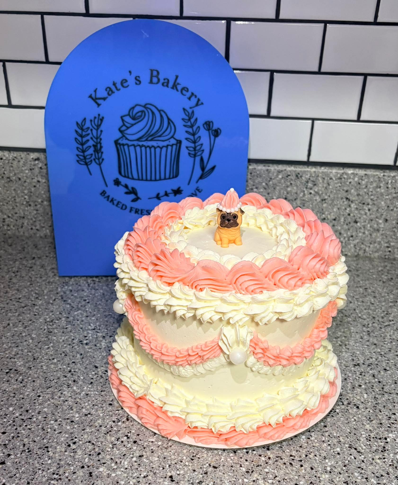 Elegant Tiered Cake with Pug Topper